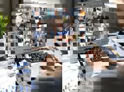 Home working Laptop open to show a video conference