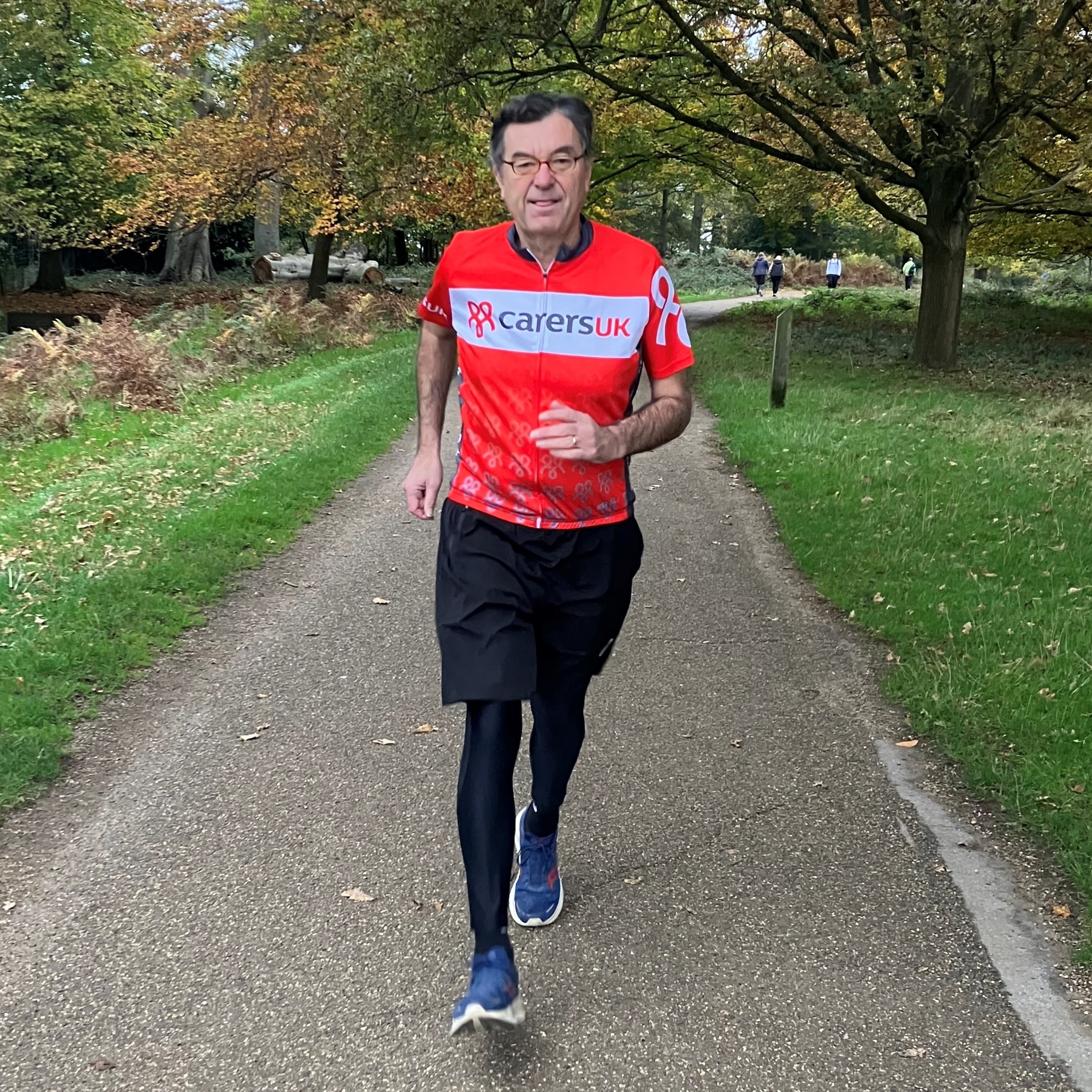 Nick Baird running through a park