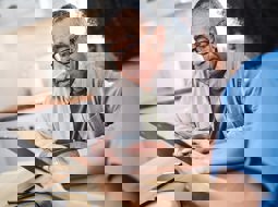 GP and patient looking at results