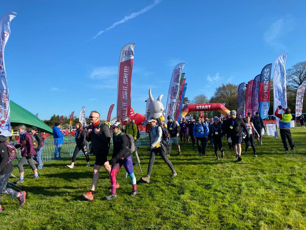 Walkers crossing the start line