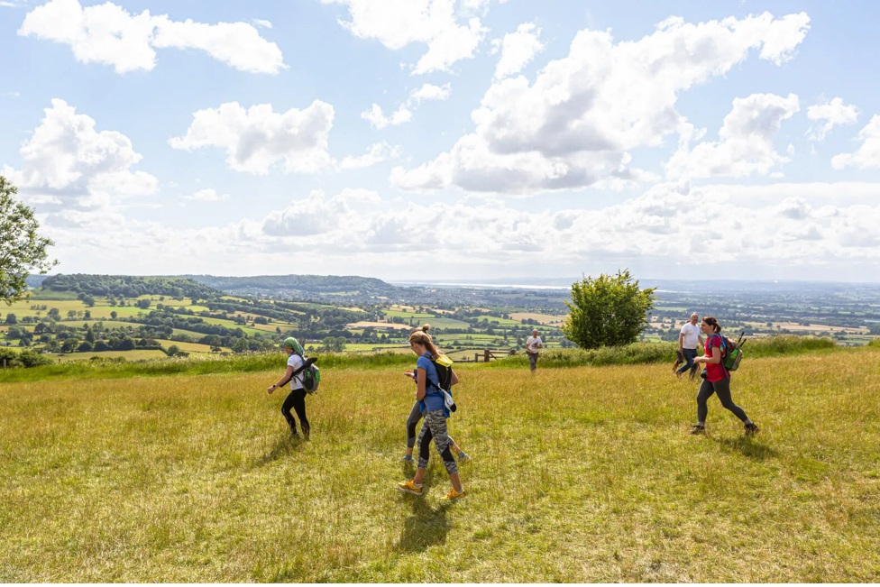 Walkers in the Peak District countryside