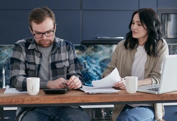 two people discussing finances